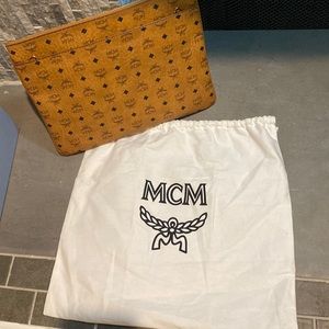 Medium logo Crossbody pouch MCM tan color brand new never worn